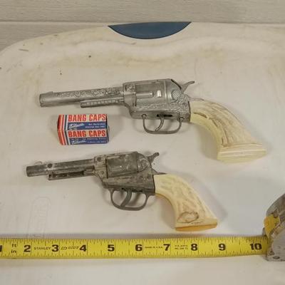 LOT 144   TWO OLD CAP GUNS WITH CAPS