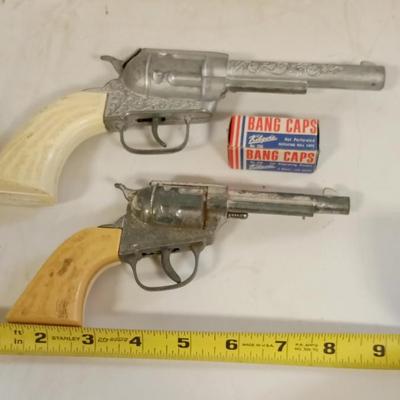 LOT 144   TWO OLD CAP GUNS WITH CAPS