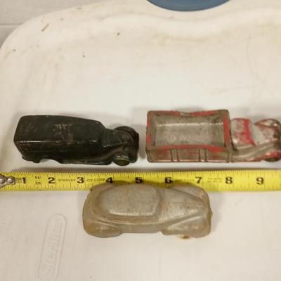 LOT 147    THREE OLD RUBBER CARS
