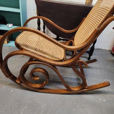 VINTAGE WOODEN CANED SWIRLED SIDES ROCKING CHAIR