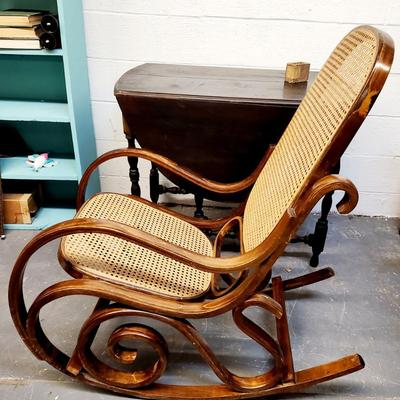 VINTAGE WOODEN CANED SWIRLED SIDES ROCKING CHAIR