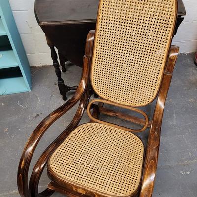 VINTAGE WOODEN CANED SWIRLED SIDES ROCKING CHAIR