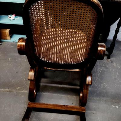 VINTAGE WOODEN CANED SWIRLED SIDES ROCKING CHAIR
