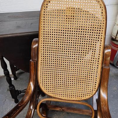 VINTAGE WOODEN CANED SWIRLED SIDES ROCKING CHAIR