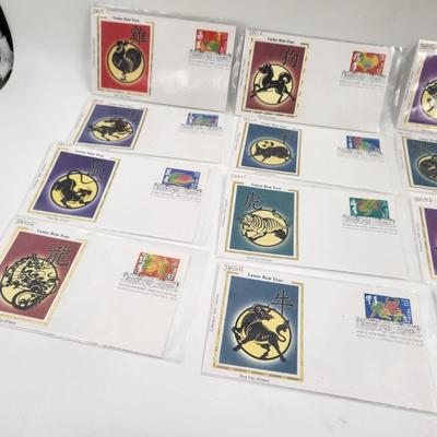 1ST DAYS STAMPS - 12 PC - 2005 LUNAR / CHINESE NEW YEAR