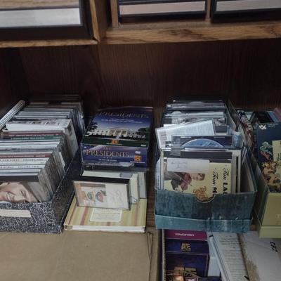 Large Collection of Cassette, VHS and DVD Music, Movies, and Informational Tapes and Discs includes Storage