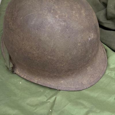 LOT:58G: Assortment of United State Military Helmets and liners, peak hat covers  and canvas field wash basins from different branches of...