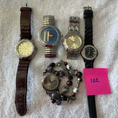 Lot of Ladies big face watches.  SWATCH