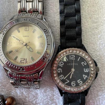 Lot of Ladies big face watches.  SWATCH