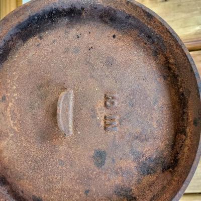 Two Cast Iron Pots