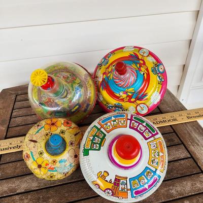 Four Vintage Spinning Top Toys