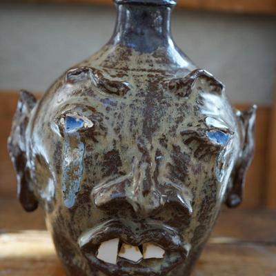 HAND CRAFTED FOLK ART "UGLY " FACE HANDLED JUG SIGNED SKINNER DATED 2005