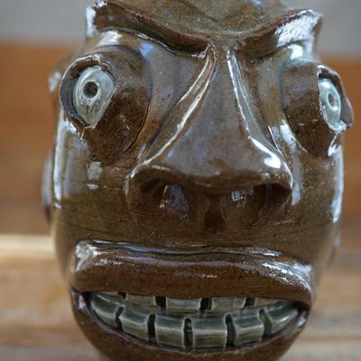HAND CRAFTER FOLK ART POTTERY "UGLY" FACE HANDLED JUG SIGNED RPT. SMALLER SIZE JUG