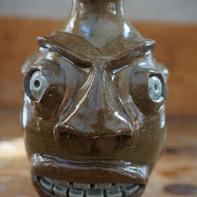 HAND CRAFTER FOLK ART POTTERY "UGLY" FACE HANDLED JUG SIGNED RPT. SMALLER SIZE JUG