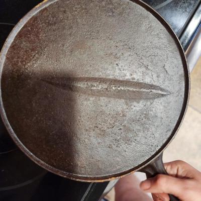 Two Cast Iron Skillets - One by Lodge
