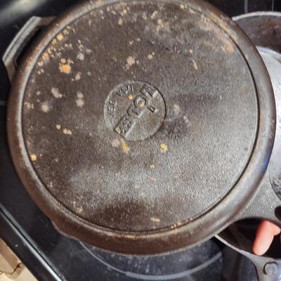 Two Cast Iron Skillets - One by Lodge