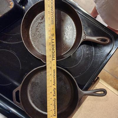 Two Cast Iron Skillets - One by Lodge
