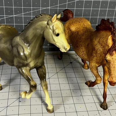 2 Breyers - 1 is an Appaloosa Horse, one Tan Horse.