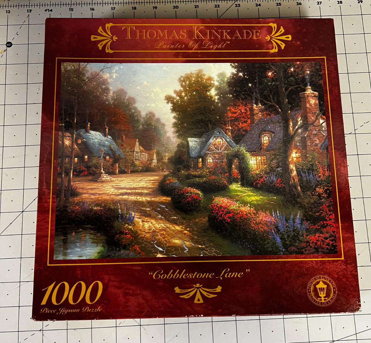 Unopened Box Of Thomas Kinkade Puzzle 1000 Pieced EstateSales Org   A 83794471 0b8c1hyt96ile6pm 