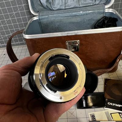 Case with an Olympus OM2 Lenses