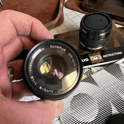 Case with an Olympus OM2 Lenses