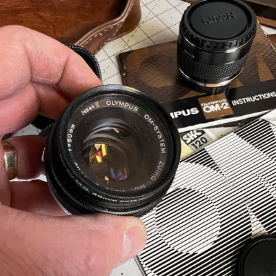 Case with an Olympus OM2 Lenses