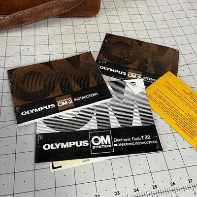 Case with an Olympus OM2 Lenses