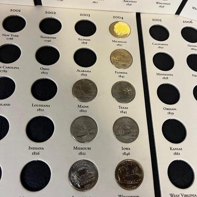 4 Partial Books of State Commemorative Quarters with 26 total Quarters in 4 books