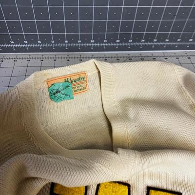 WAA Wool Sweater with a "W" on it 