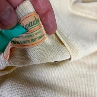 WAA Wool Sweater with a "W" on it 