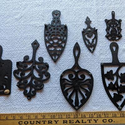 Collection of Vintage Cast Iron Trivets, 2 smalls