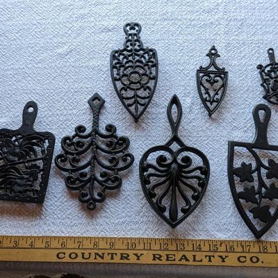 Collection of Vintage Cast Iron Trivets, 2 smalls