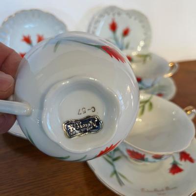 Norcrest Mix of Tea Cups and Plates all with Indian Paint Brush Wyoming imprinted on 