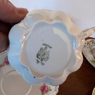 4 Tea Cups Mostly white with Flowers