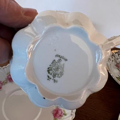 4 Tea Cups Mostly white with Flowers