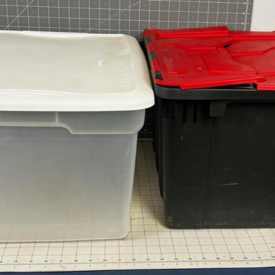 2 Storage Tubs Clear and Black. 