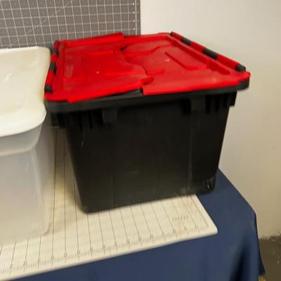 2 Storage Tubs Clear and Black. 