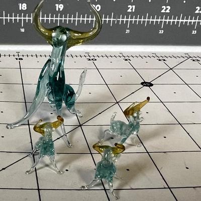 4 Glass Bulls with Amber Horns