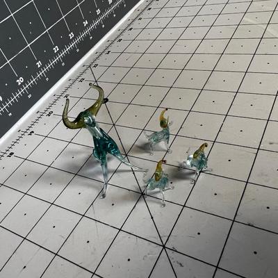 4 Glass Bulls with Amber Horns