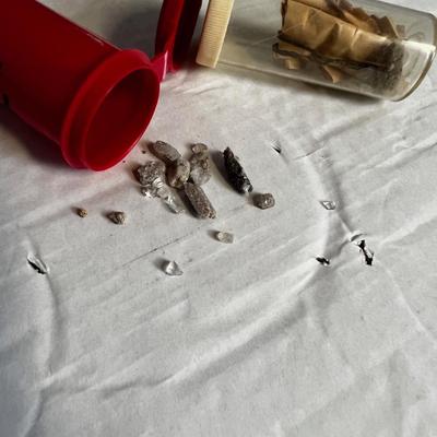 2 Pill Bottles of Crystals Marked Topaz Mountain 