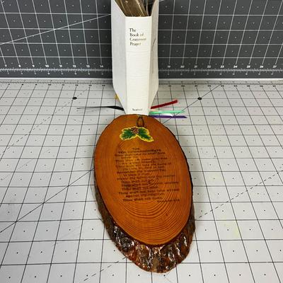 A Plaque of Ten Commandments and a Book of Prayer