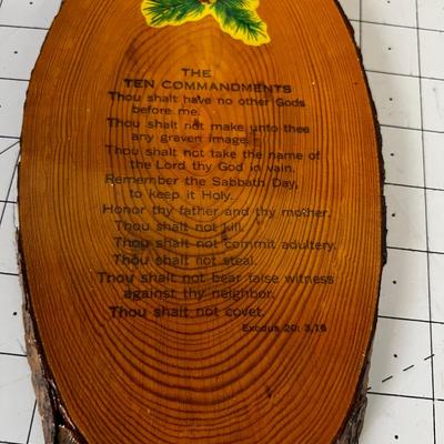A Plaque of Ten Commandments and a Book of Prayer