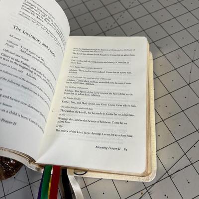 A Plaque of Ten Commandments and a Book of Prayer