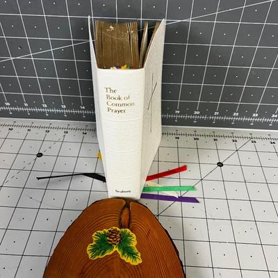 A Plaque of Ten Commandments and a Book of Prayer