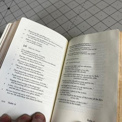A Plaque of Ten Commandments and a Book of Prayer