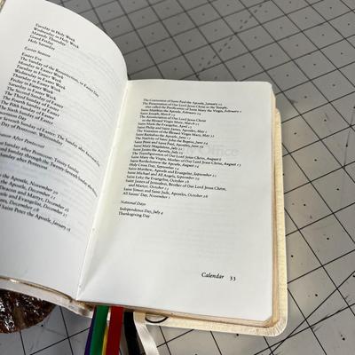 A Plaque of Ten Commandments and a Book of Prayer