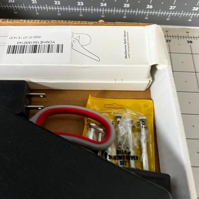 Tray of Electrical things; Cables, juice pack, garage Door openers, Alarms