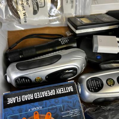 Tray of Electrical things; Cables, juice pack, garage Door openers, Alarms