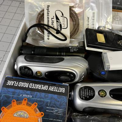 Tray of Electrical things; Cables, juice pack, garage Door openers, Alarms