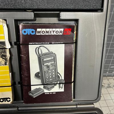 System OTC Car Checking the Engine Light on Cars. 